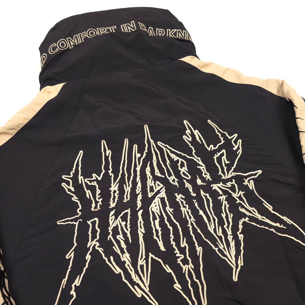 เสื้อกันลมพายุฝุ่น