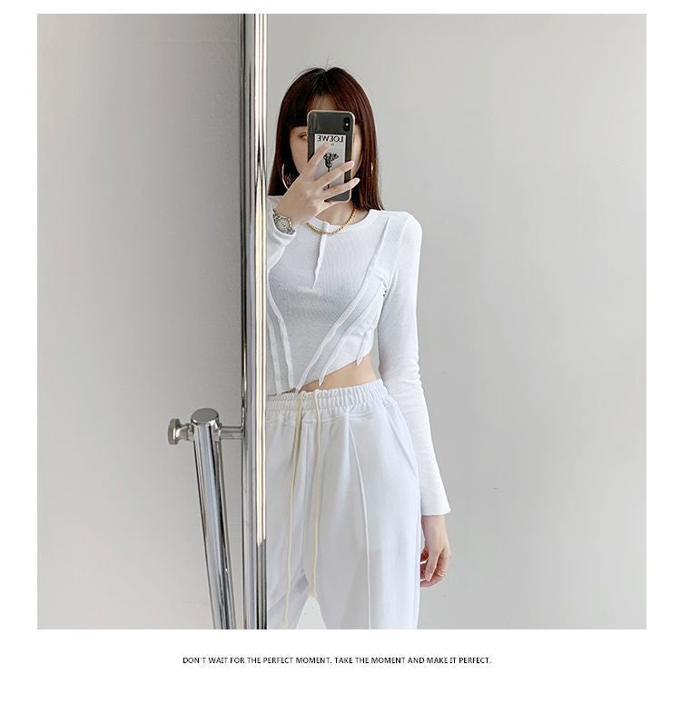 เสื้อครอปเข้ารูปผู้หญิง เสื้อยืดทรงไม่สมมาตรชายเฉียง คอกลม แขนยาว