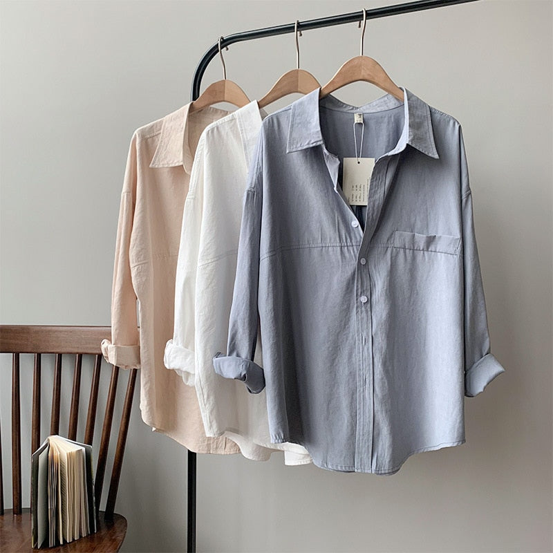 เสื้อเชิ้ตผู้หญิงคอปกพับสีพื้นทรงหลวม เสื้อเบลาส์ฤดูใบไม้ผลิและฤดูร้อน