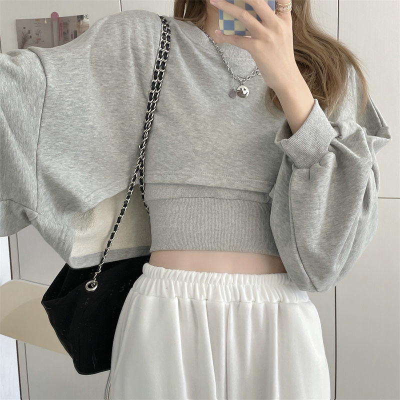 ชุดเซ็ตสองชิ้นสำหรับฤดูใบไม้ร่วง เสื้อฮู้ดผู้หญิงทรงหลวมแขนค้างคาว เสื้อครอปสเวตเตอร์แฟชั่นยอดนิยม+เสื้อสายเดี่ยว