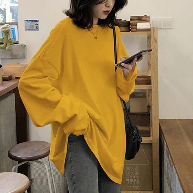 เสื้อยืดแขนยาวทรงโอเวอร์ไซส์สีพื้นสไตล์ฮาราจูกุสำหรับผู้หญิง เสื้อยืดตัวยาวน่ารักสำหรับใส่ในฤดูใบไม้ผลิและฤดูใบไม้ร่วง