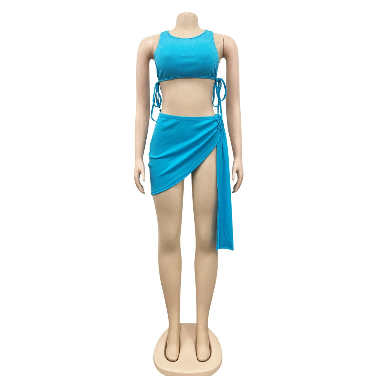 ชุดเซ็ตสองชิ้นผ้าถักร่อง ท่อนบนครอปสไตล์ผ้าพันแผล กระโปรงสั้นรัดรูป ชุดเที่ยวทะเล ชุดแฟชั่นฤดูร้อน