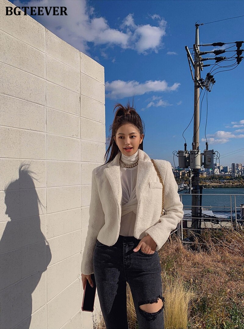 กางเกงยีนส์ทรงดินสอผู้หญิงขาดรูไม่สม่ำเสมอ ทรงเอวสูงสุดเก๋ ยืดหยุ่น