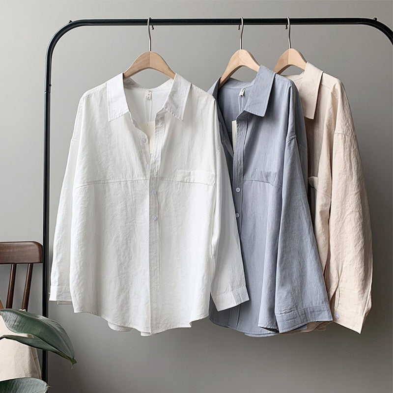 เสื้อเชิ้ตผู้หญิงคอปกพับสีพื้นทรงหลวม เสื้อเบลาส์ฤดูใบไม้ผลิและฤดูร้อน