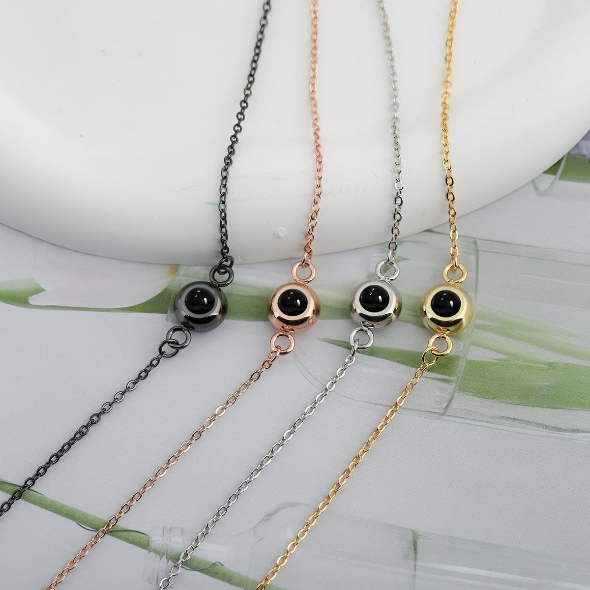 สร้อยข้อมือถักสเตนเลสไทเทเนียมแบบใส่รูปภาพได้ ออกแบบมาเพื่อการแสดงผลสีตามรูปภาพ