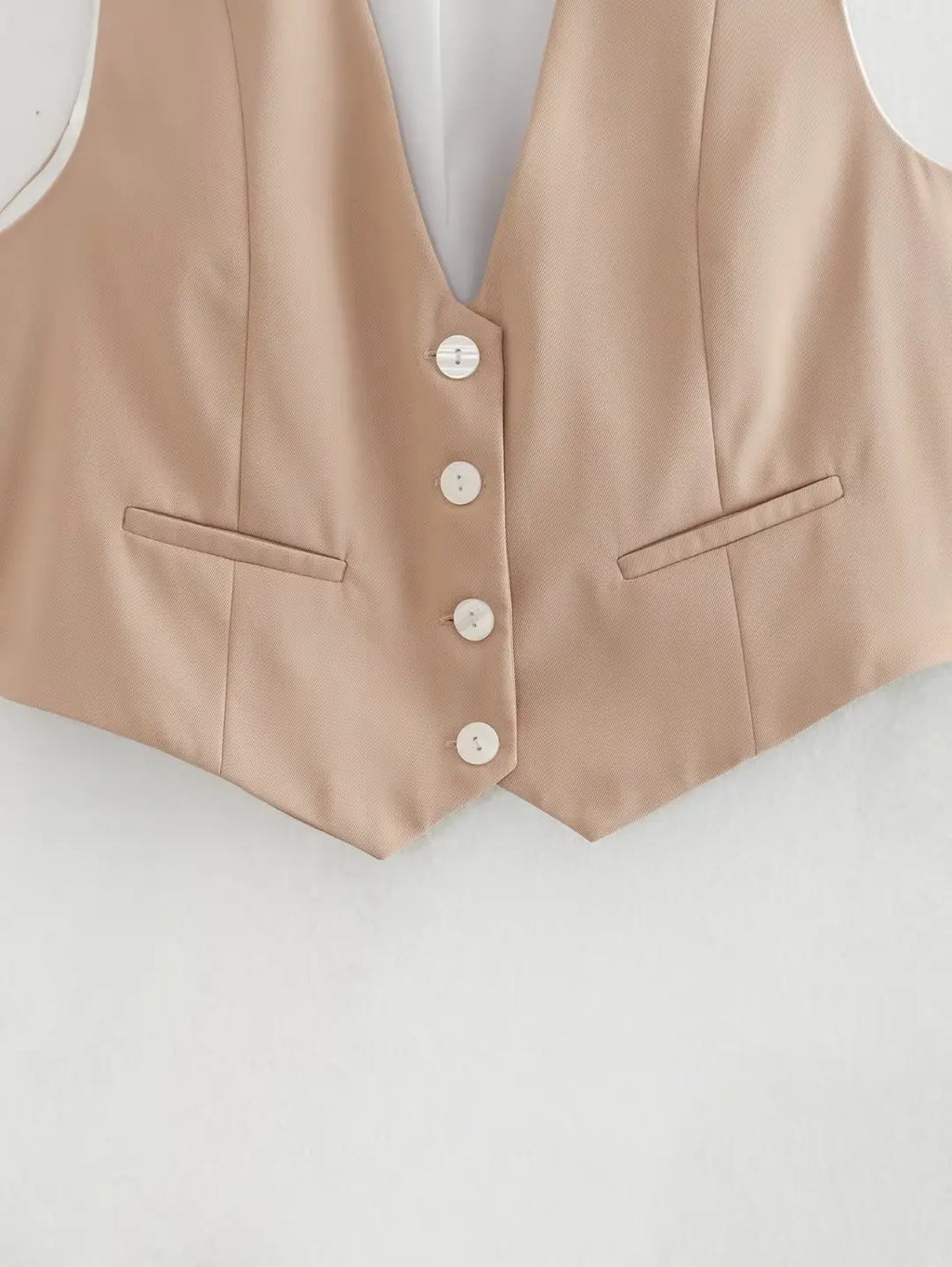 เสื้อกั๊กคลุมสตรีคอวีแขนกุดสไตล์วินเทจสีขาวสุดเก๋
