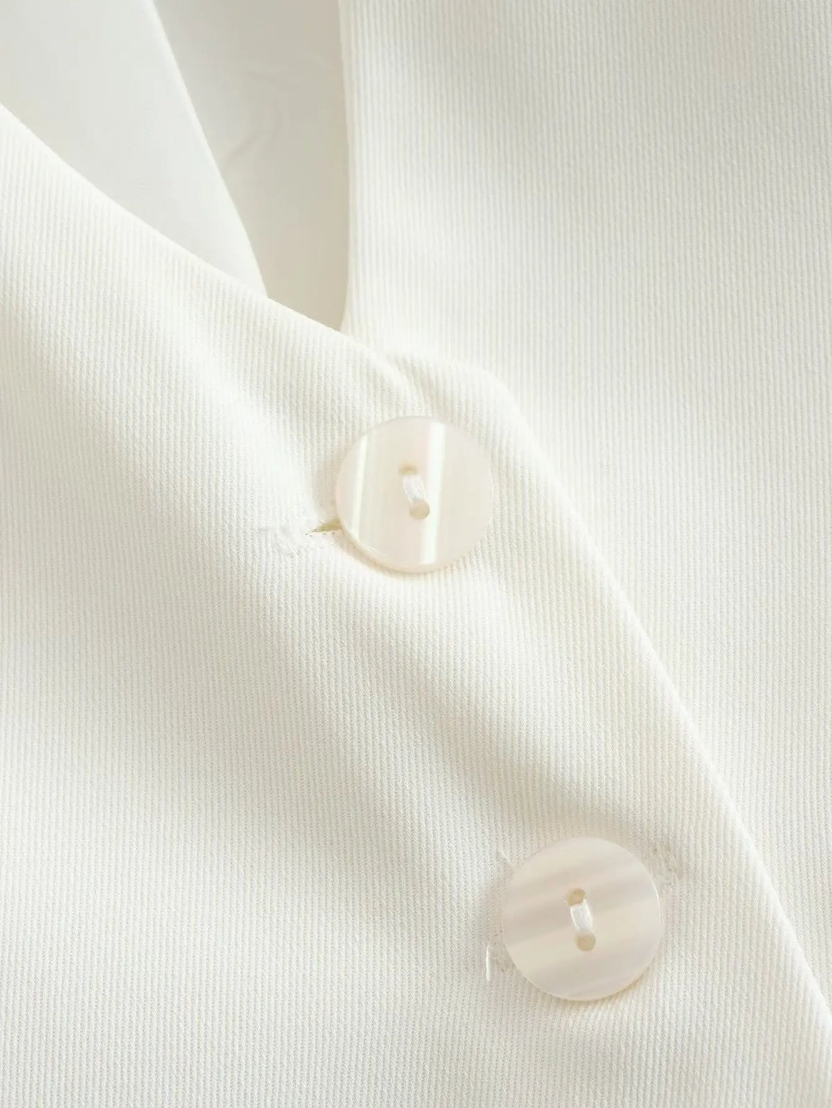เสื้อกั๊กคลุมสตรีคอวีแขนกุดสไตล์วินเทจสีขาวสุดเก๋