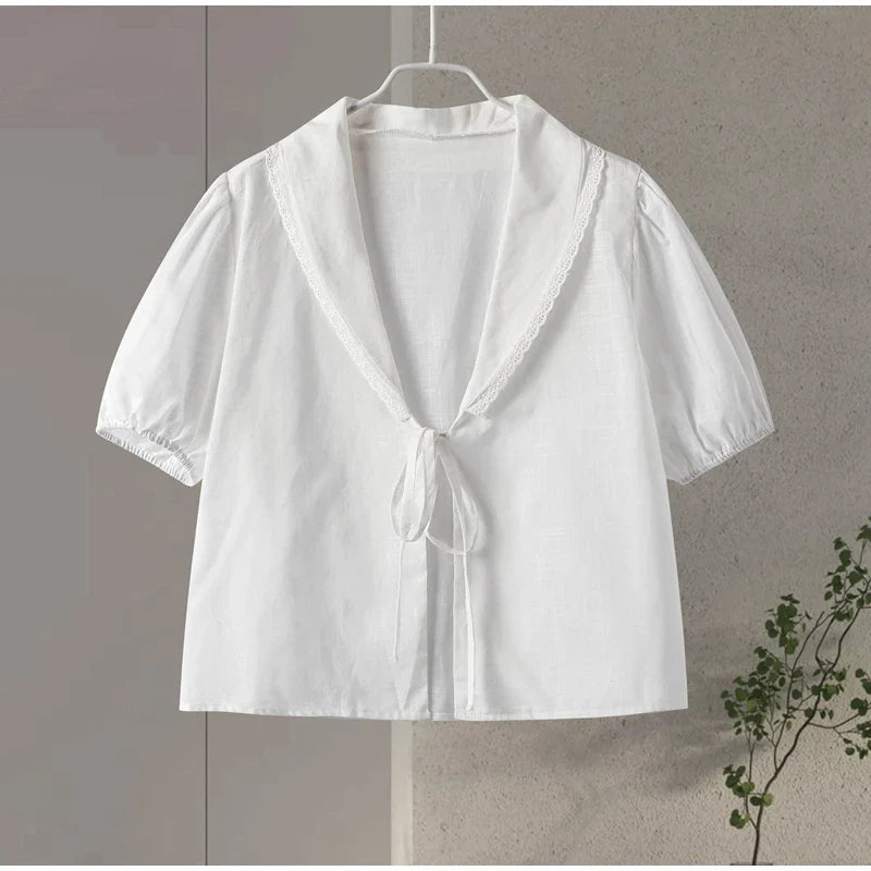 ชุดเซ็ตเสื้อคอแต่งระบายผูกเชือกกับกระโปรงสั้นพองแขน กระโปรงจีบสั้น