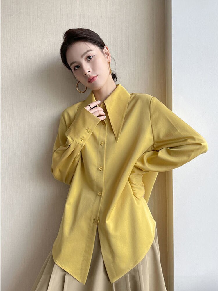 เสื้อเชิ้ตสีขาวคอปกแหลมขนาดใหญ่สำหรับผู้หญิง สไตล์วินเทจ ทรงหลวม แขนยาว