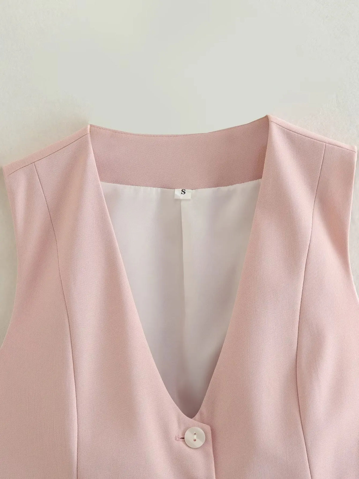 เสื้อกั๊กคลุมสตรีคอวีแขนกุดสไตล์วินเทจสีขาวสุดเก๋