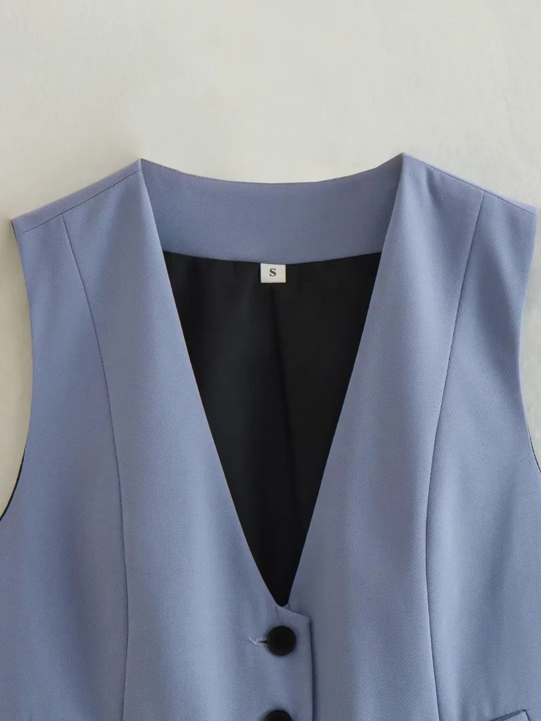 เสื้อกั๊กคลุมสตรีคอวีแขนกุดสไตล์วินเทจสีขาวสุดเก๋