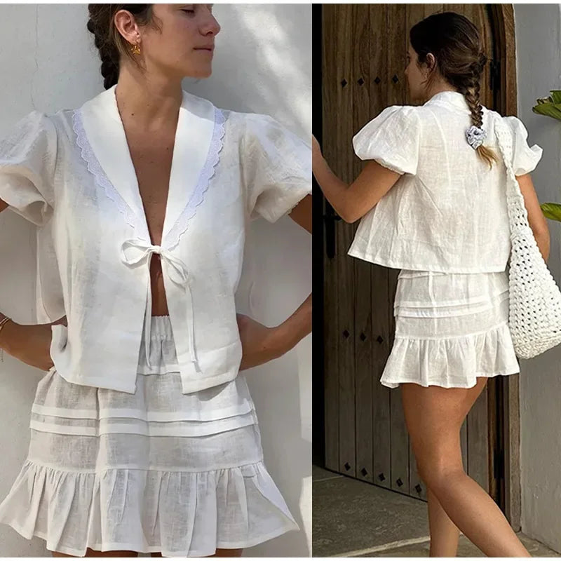 ชุดเซ็ตเสื้อคอแต่งระบายผูกเชือกกับกระโปรงสั้นพองแขน กระโปรงจีบสั้น