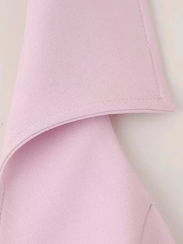 เสื้อคอวีคอคล้องคอแขนกุดกระโปรงสั้นรัดสะโพกชุดเซ็ตสองชิ้นแฟชั่นสตรีทสตรี