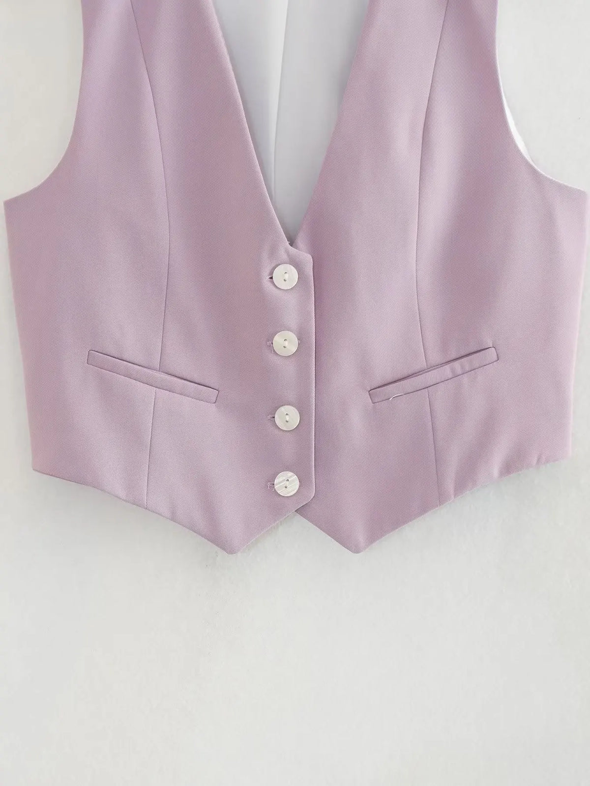 เสื้อกั๊กคลุมสตรีคอวีแขนกุดสไตล์วินเทจสีขาวสุดเก๋
