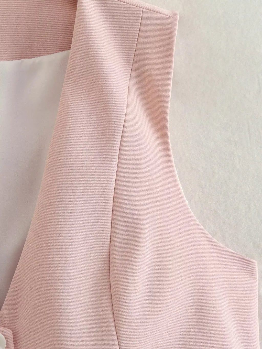 เสื้อกั๊กคลุมสตรีคอวีแขนกุดสไตล์วินเทจสีขาวสุดเก๋