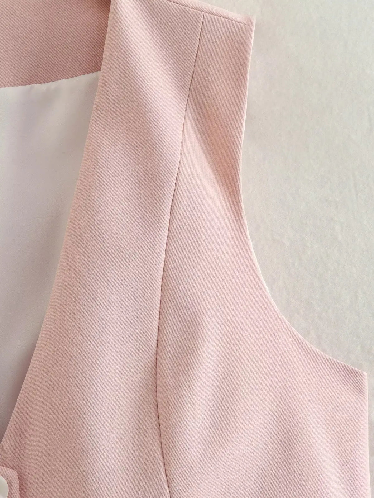 เสื้อกั๊กคลุมสตรีคอวีแขนกุดสไตล์วินเทจสีขาวสุดเก๋